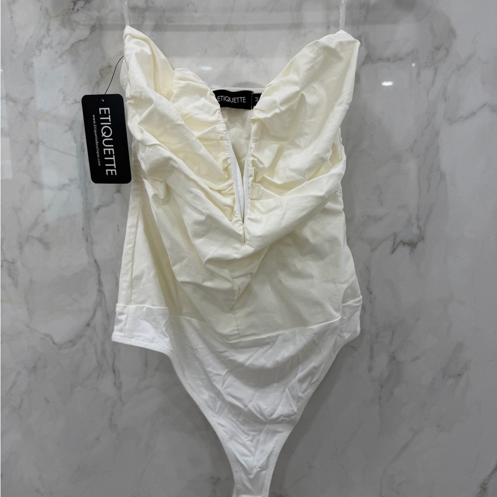 Etiquette Clothiers Cream Bodysuit
